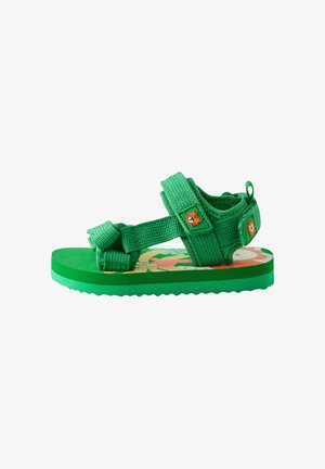 Sandalo verde per bambini con cinturini regolabili, toppe con facce di tigre e design interno colorato a fiori.