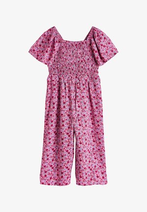 Rausvos spalvos plačių kojų kombinezonas su raudonos ir mėlynos spalvos gėlių raštu, trumpomis pūstomis rankovėmis, kvadratine iškirpte ir raukšlėtu liemeniu.