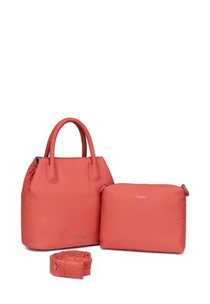 Coral tote bag with rounded handles, smooth texture, and a detachable inner pouch. Includes a rolled strap for additional carrying options.