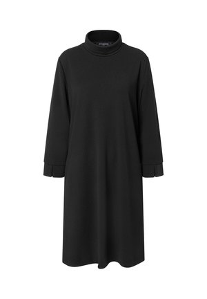 Robe noire à manches longues, longueur genoux, avec un col montant et des poignets rabattus, présentée sur un fond blanc.