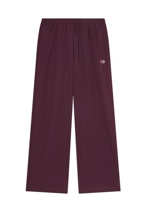 Pantaloni larghi di colore viola scuro con elastico in vita, tasche laterali e piccolo logo Champion sulla coscia destra.