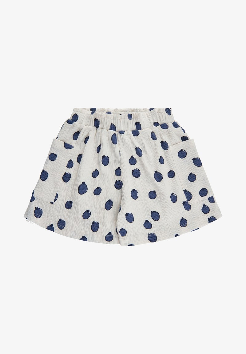 Białe teksturowane szorty z elastycznym pasem, dużymi granatowymi groszkami i bocznymi kieszeniami naszywanymi.