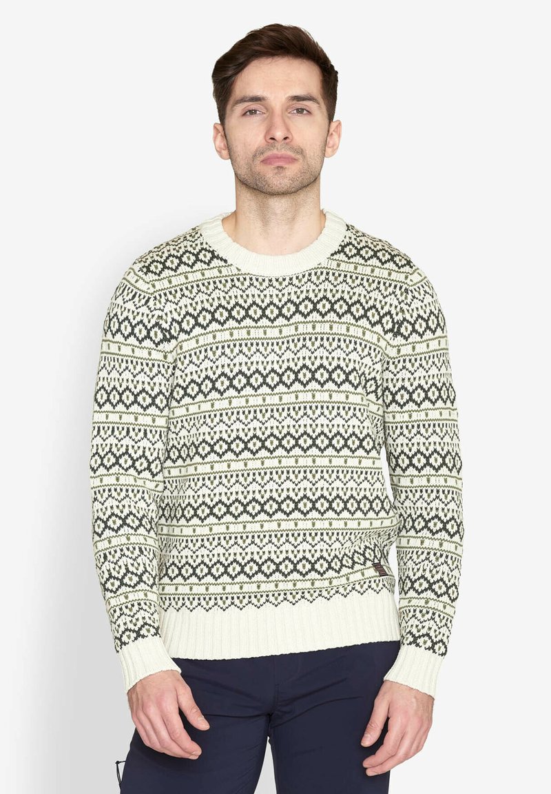 Strikket sweater i creme og mørkegrøn med geometriske mønstre. Har en rund hals og ribbede manchetter og kant. Teksturert stof.