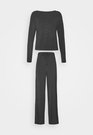 Ensemble de vêtements de détente gris foncé comprenant un haut à manches longues et un pantalon à cordon de serrage. Tissu doux, coupe décontractée et design à jambe large.