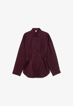 Dark purple long-sleeve button-up shirt with a pointed collar and tailored seams on a white background.