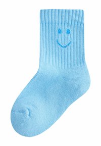 Hele sinine puuvillane sokk soonilise tekstuuriga, mille ülaosas on tumesinise tikitud naeratava näo kujundus. Tavapärane pahkluu pikkus.