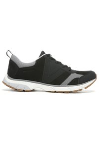Black athletic shoe with gray accents, featuring a textured upper, padded collar, and a white midsole. Rubber outsole with a patterned grip.