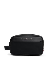 Black toiletry bag with a smooth leather finish, featuring a front zip pocket, embossed logo, and a side handle for easy carrying.