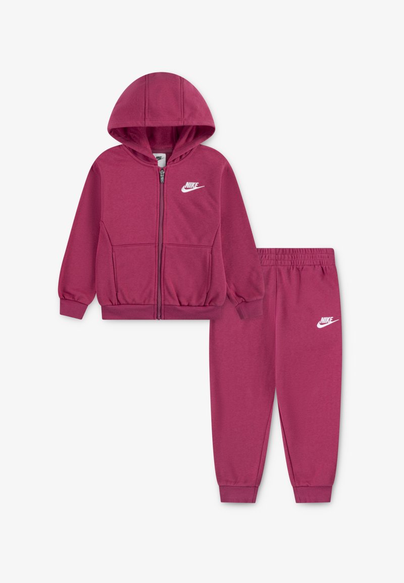 Maroon zip-up hoodie with a hood, front pockets, and white Nike logo. Matchings pants with elastic waistband and cuffs also feature the logo.