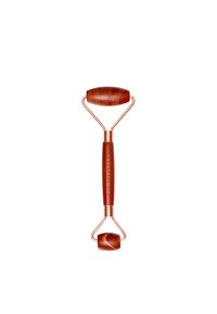Red jade facial roller with a sturdy, rose gold metal frame. Features two rolling stones: one larger and oval, one smaller and round.