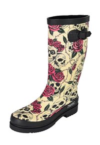 Rubber rain boot featuring a cream background with a skull and rose pattern. Black trim and buckle detail at the top, textured tread sole.