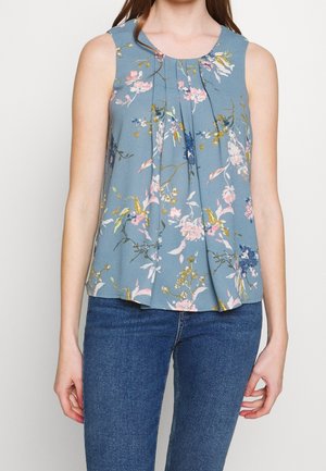 Top senza maniche a fantasia floreale blu, con pieghe, scollatura tonda e vestibilità rilassata. Realizzato in tessuto leggero.