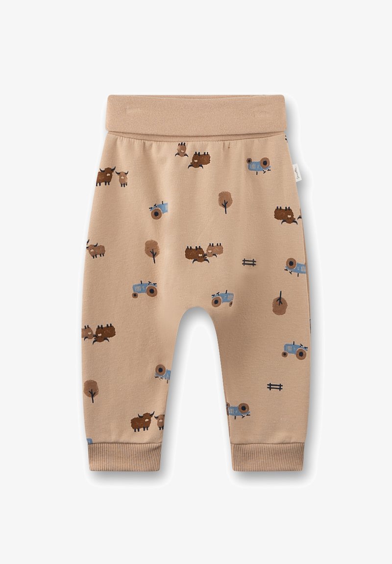 Beige Jersey-Hosen mit einem elastischen Bund, die ein Muster aus braunen Bisons, blauen Traktoren und braunen Bäumen aufweisen, mit umgeschlagenen Knöcheln.