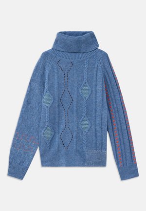 Blue knitted sweater with a turtleneck, featuring geometric patterns, textured accents, and contrasting red and green embroidery details.