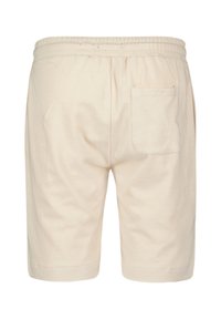 Lichtbeige shorts van zacht materiaal, met een elastische tailleband, achterzak en rechte snit, met een gladde textuur.