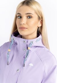 Schmuddelwedda Vízálló dzseki - helllavendel