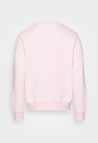 Różowa bawełniana bluza z okrągłym dekoltem, długimi rękawami, ściągaczami na mankietach i prostym dołem, o gładkiej fakturze i minimalistycznym designie.