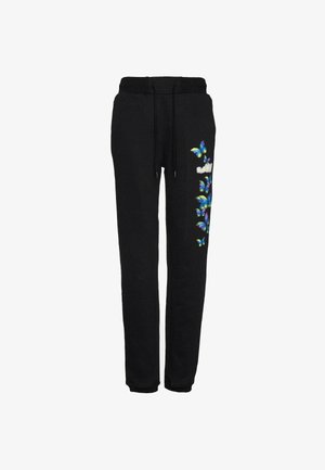 Pantaloni della tuta neri con vita elastica, dettaglio con coulisse e stampa di farfalle colorate lungo il lato sinistro. Materiale in cotone morbido.