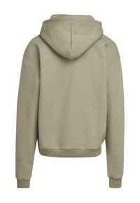 Haut à capuche beige avec cordon de serrage, poignets et ourlet côtelés, présentant une coupe décontractée et un tissu doux et texturé. Vue arrière incluse.