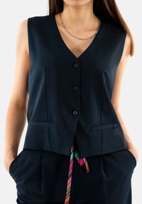 PLEASE Chaleco - bleu