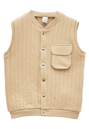 Beżowa pikowana bezrękawnik dziecięcy z zatrzaskami na przodzie i pojedynczą klapką kieszonki na lewej piersi.