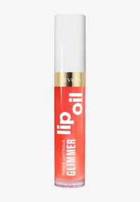 Olio per labbra luminoso Super Lustrous di Revlon in un tubo trasparente, con un tappo bianco, accenti dorati e scritte bianche audaci su uno sfondo rosa.
