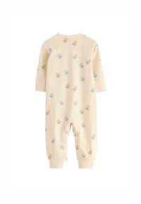 Lys gul baby jumpsuit med blomsterprint i blå, pink og sennep. Har lange ærmer og lynlåsåbninger ved benene. Blødt bomuldsmateriale.