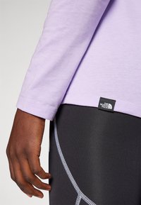 The North Face SIMPLE DOME TEE - Top dugih rukava - lite lilac