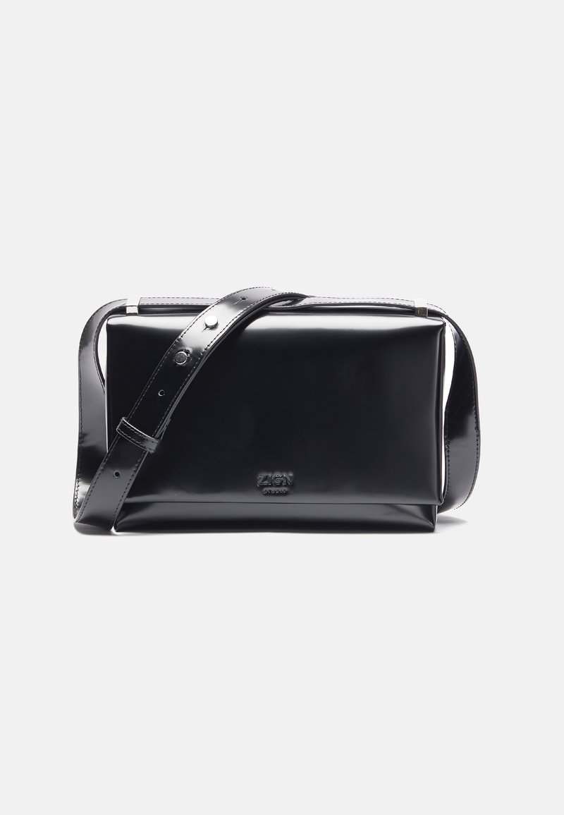 Black, glossy, rectangular handbag with a detachable shoulder strap and silver hardware. Features a smooth texture and embossed logo.