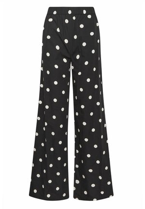 Pantalon noir à jambes larges avec des pois blancs et une ceinture élastique, présenté sans accessoires visibles ni arrière-plan.