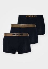 Navy blue boxer briefs set with a smooth, stretchy fabric. Features a gold elastic waistband with "DIESEL" logo prominently displayed.