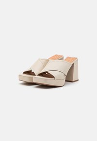 mtng Mules à talons - white