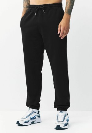 RELAXED FIT - RICH  - Træningsbukser - black
