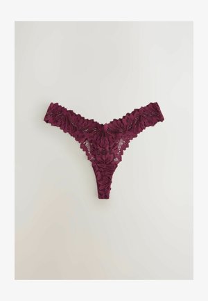 Burgundy lace thong with floral pattern, scalloped edges, and sheer texture, designed for minimal coverage and detailed accents.
