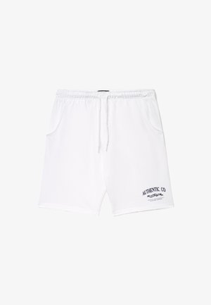 Shorts bianchi in cotone con vita elastica, coulisse e tasche laterali. Presentano un logo blu navy "AUTHENTIC CO" sul lato inferiore sinistro.