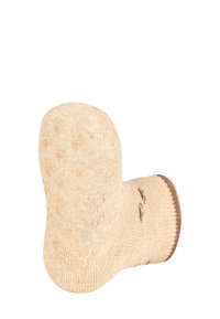 Beige Sock mit strukturiertem Strick, präsentiert ein gepunktetes Muster und einen braunen Rippenbund am Knöchel. Weiches Material für Komfort.