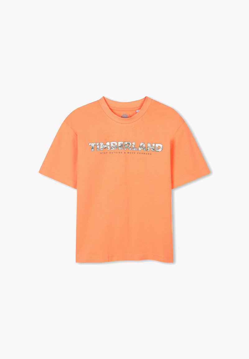 Oranje katoenen t-shirt met een ronde hals. Heeft een witte "TIMBERLAND" logo met een patroonvulling. Korte mouwen en rechte zoom.