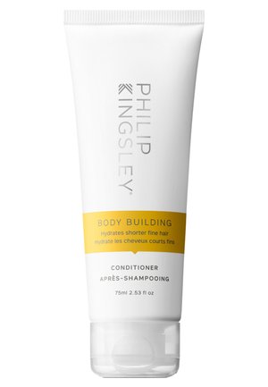 Tuyau blanc d'après-shampooing avec une étiquette jaune indiquant "BODY BUILDING." Comprend le nom de marque "PHILIP KINGSLEY" en gris. Contient 75 ml.