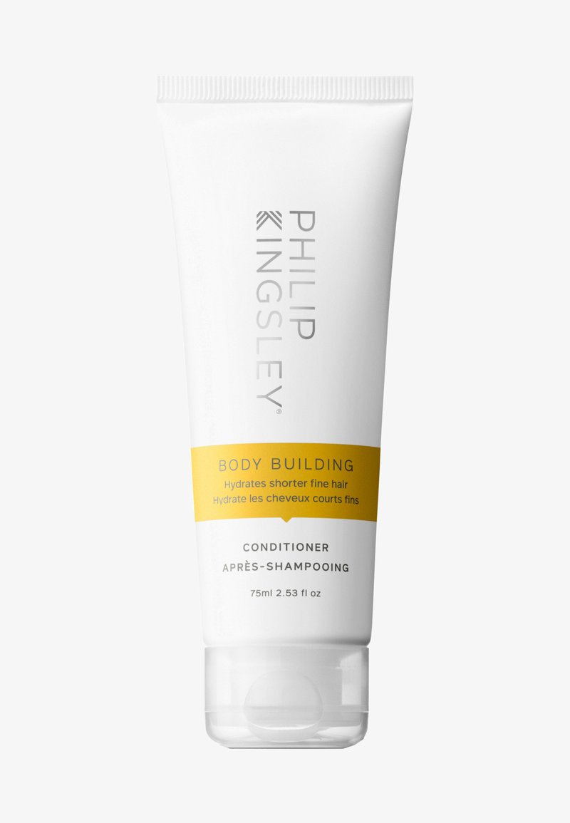 White tube of conditioner with a yellow label stating "BODY BUILDING." Features brand name "PHILIP KINGSLEY" in gray. Contains 75ml.