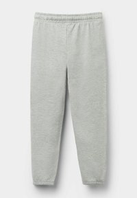 Světle šedé tepláky s elastickým pasem a manžetami. Měkká textura s hladkým povrchem. Zúžený střih nohavic bez kapes.