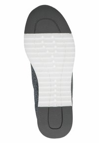 Suola della scarpa con parte superiore in gomma grigio scuro testurizzata e battistrada bianco con motivo a scanalature e solchi per la trazione.