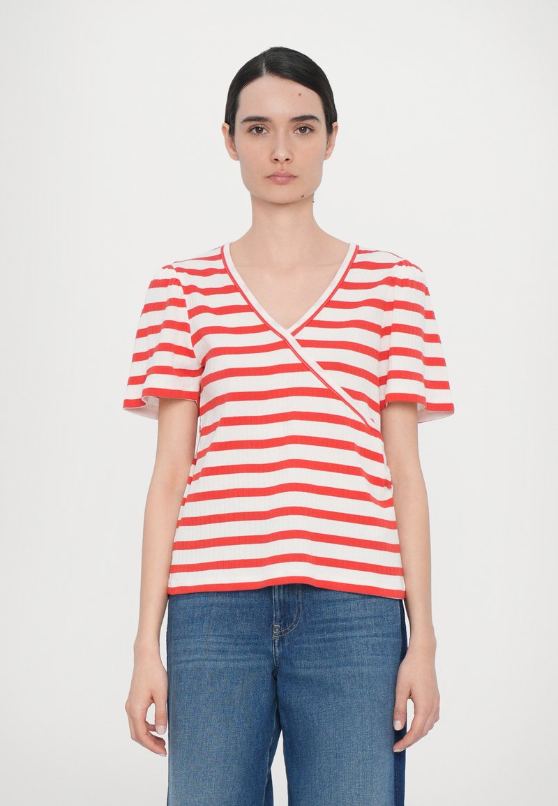 Red and white striped short-sleeve top with a V-neckline and ribbed texture. The design features an asymmetrical hem and contrasting edges.
