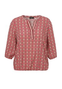 Rote und cremefarbige Bluse mit Muster, V-Ausschnitt, Dreiviertelärmeln und gerafftem Saum. Besitzt ein geometrisches Diamantdesign.