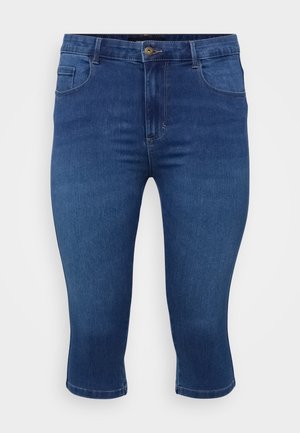 Pantaloni capri din denim în nuanță închisă, cu croială dreaptă. Au un buzunar frontal, talie cu bucle pentru curea și cusături decorative.