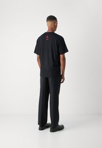 HUGO DIGHTMARE  - T-shirt med print - black
