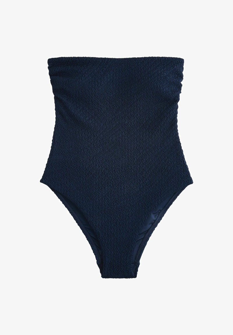 Maillot de bain une pièce bleu marine foncé texturé, sans bretelles, avec des ouvertures de jambe taille haute et un bord supérieur froncé.