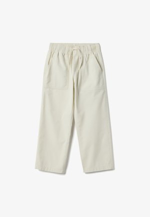 Pantalones beige claro con cintura elástica y cordón ajustable. Tienen dos bolsillos delanteros y un ajuste relajado con piernas rectas. Hechos de algodón.