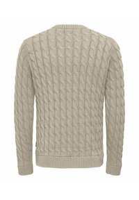 Pull en laine beige avec motif en relief, col rond, et poignets et ourlet côtelés. Design classique adapté pour le superposition.