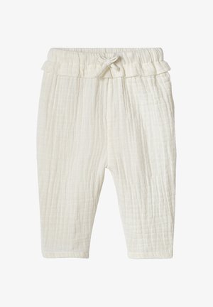 Soft white baby pants with a textured fabric, elastic waistband, and small decorative bow tie at the front.