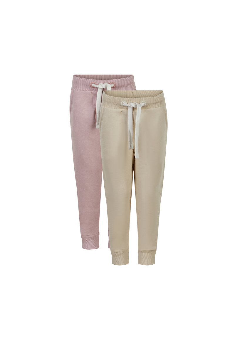 Two pairs of sweatpants: one light pink, one beige. Both feature drawstring waistbands, side pockets, and tapered ankles with ribbed cuffs.
